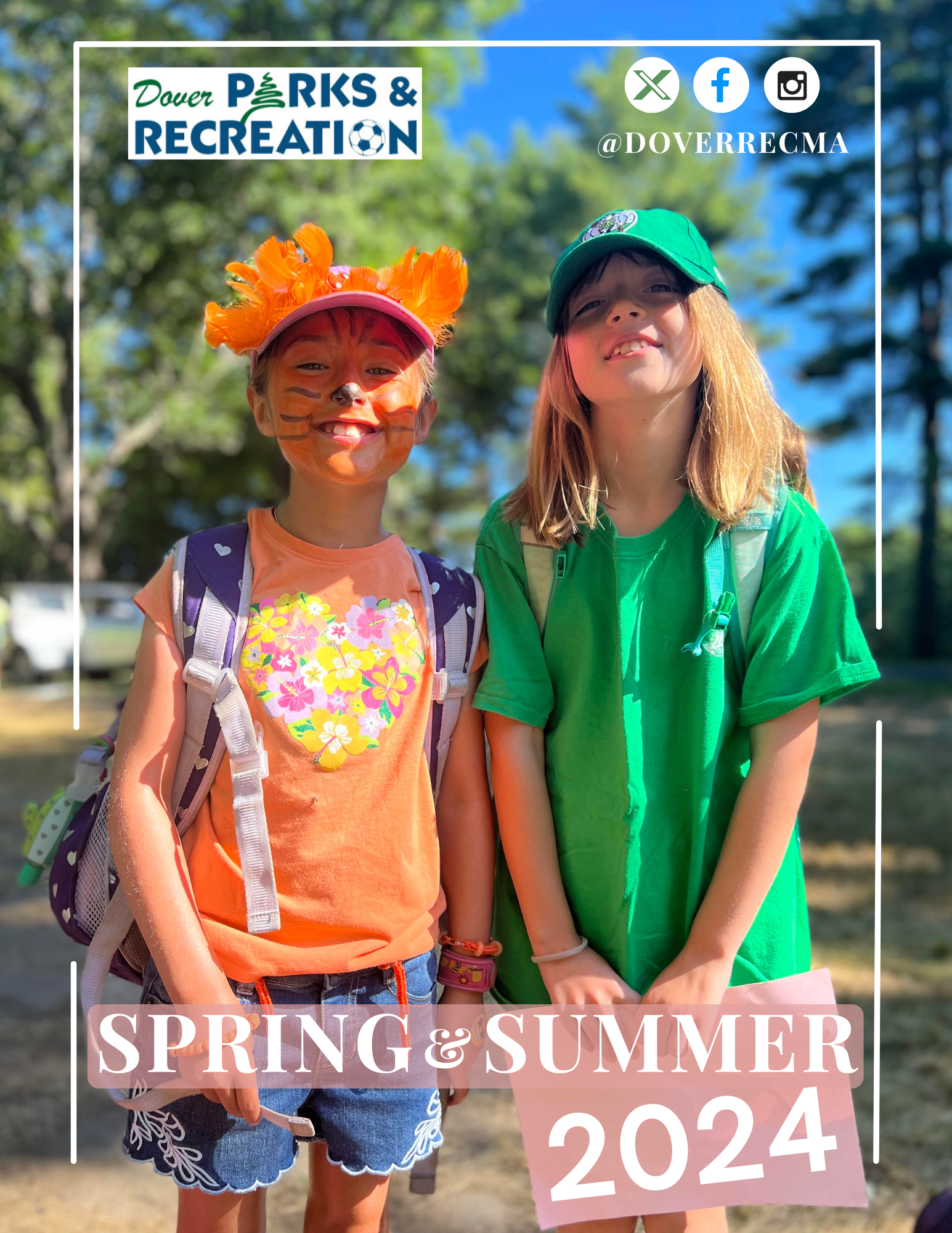 two girls, one in all orange the other in all green, representing their camp teams 